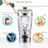 A cup of portable fruit juice, electric fruit mixer, a large cup